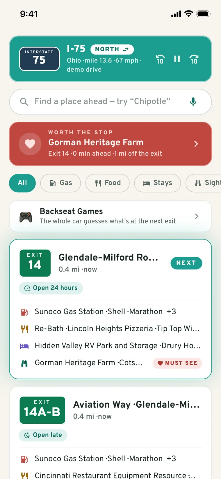 Pit Stop showing the exits ahead on I-75: Exit 14 next with gas, food, stays, a must-see farm, comfort badges, and Backseat Games one tap away
